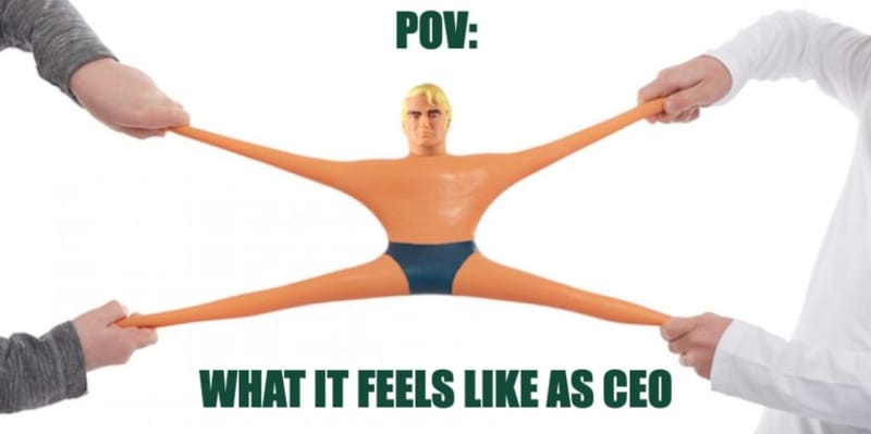 Meme of a Stretch Armstrong toy pulled in four directions by four hands, captioned POV: what it feels like as CEO